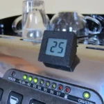 a close-up of a shot timer